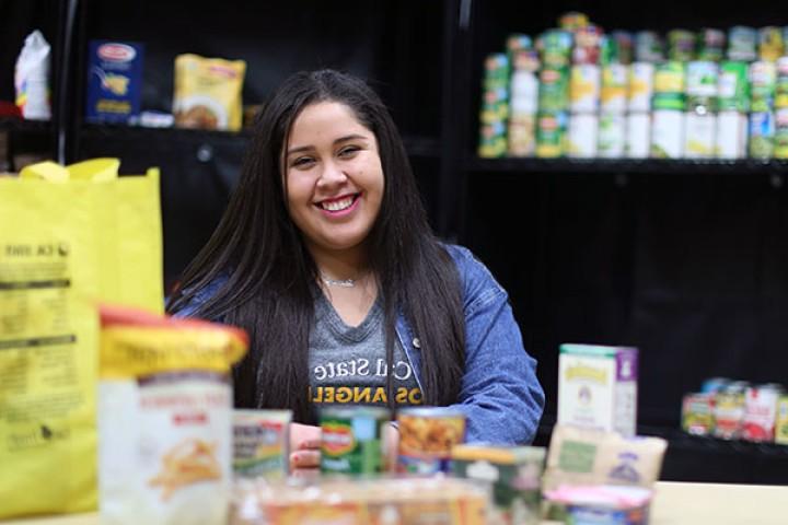 Smiling student in food pantry